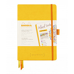 Rhodia Rhodiarama Goalbook Dotted Bullet Journal - Hardcover - A5 - Ivoor Papier - Jonquille
